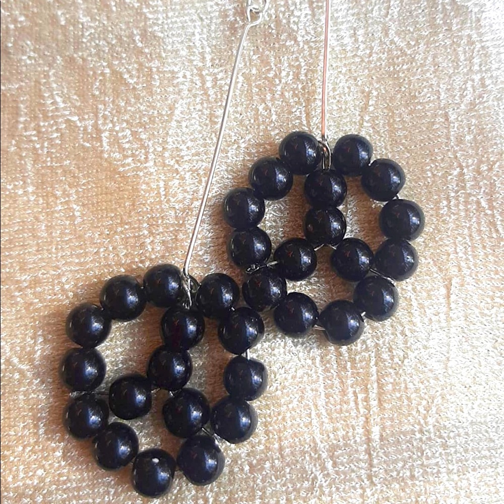 Women’s fashion handmade pearl earrings .